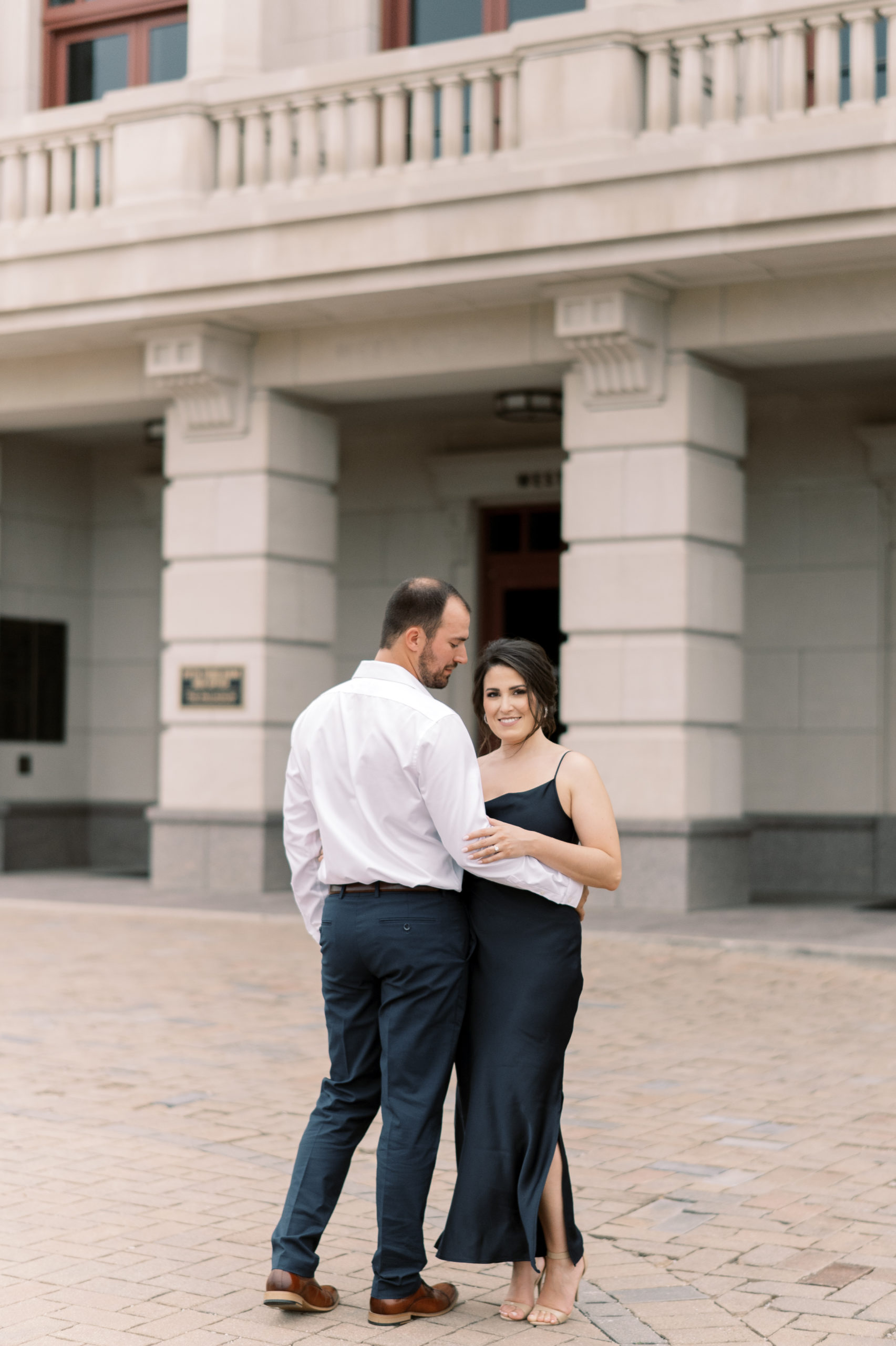 Engagement session in Carmel, Indiana. Noblesville wedding photographer. Palladium, performing arts center photoshoot. Sleek building in Indianapolis. Outfit ideas for formal engagement session. Places with flowers in Indianapolis. Classic, luxury engagement session. Bloomington Indiana. The Wilds Venue. Hotel Carmichael wedding photography. Fishers, Indiana. Midwest luxury venue. Fine-art film photographer.