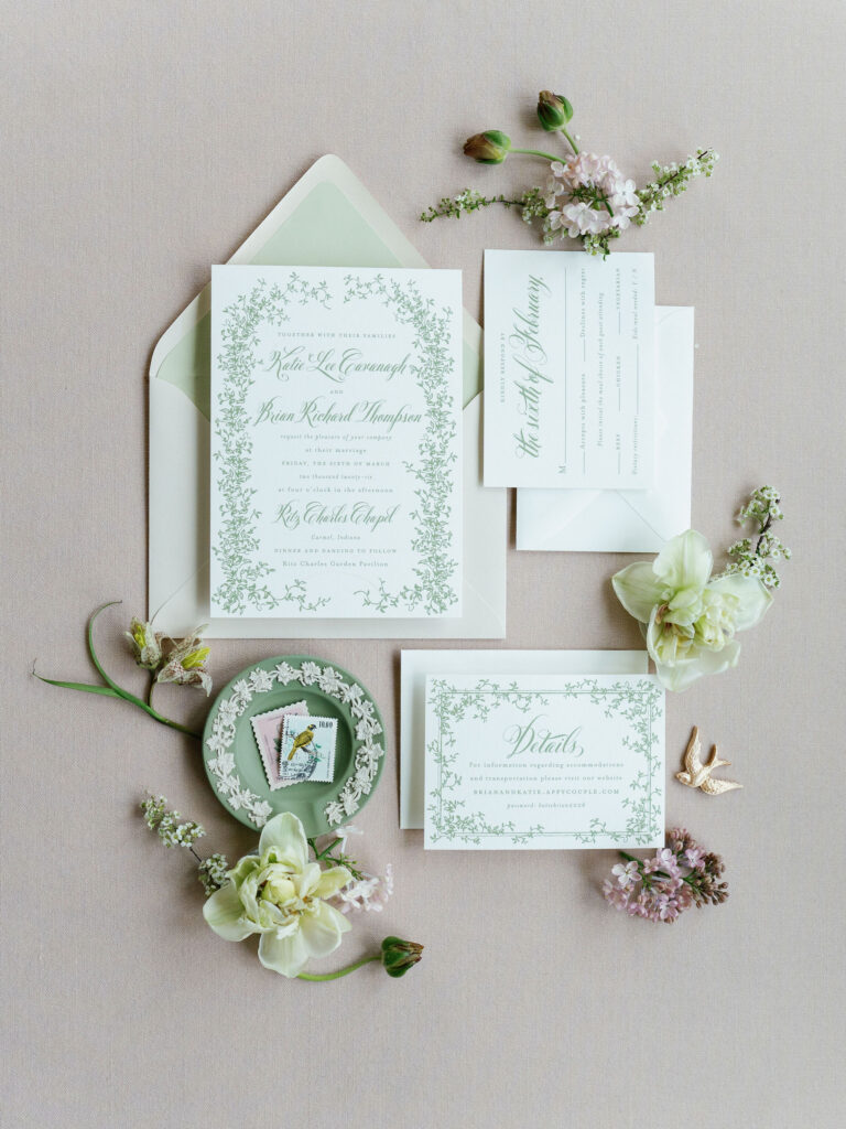 Spring wedding stationery flatlay with lavender and green palette at Ritz Charles wedding in Carmel Indiana
