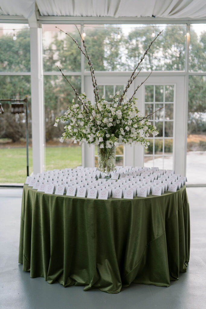 Campanula center piece on escort card table during cocktail hour in Carmel, Indiana